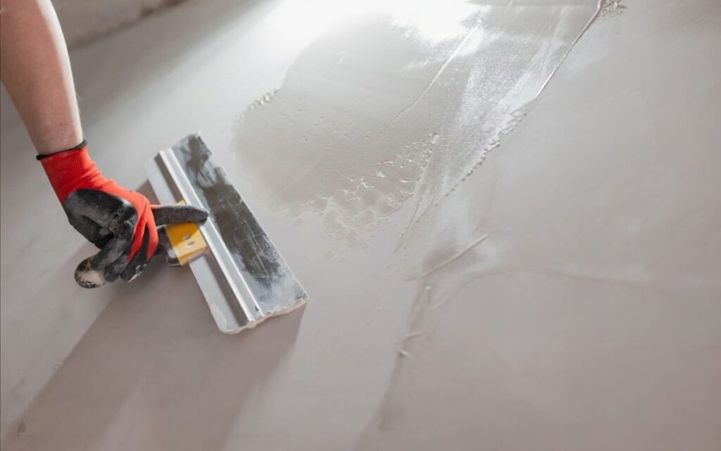 Gypsum plaster application on wall surface using gypsum based plaster