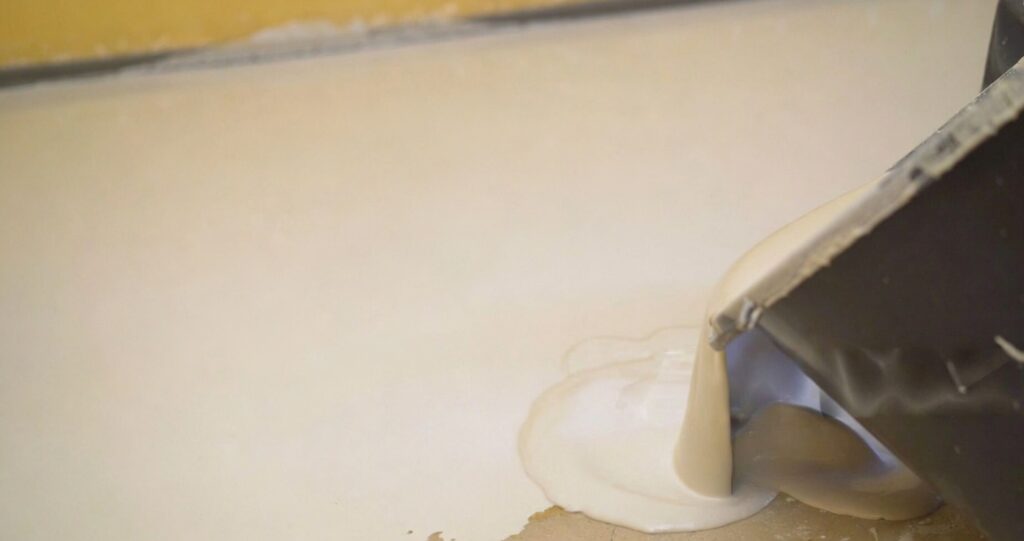 Gypsum self leveling floor application using gypsum based self leveling compound